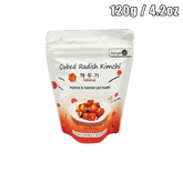 Cubed radish kimchi in a 120g stand-up pak with traditional Korean design