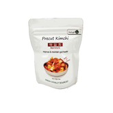 Precut fermented kimchi in a 120g pak with orange-red color and clean labeling
