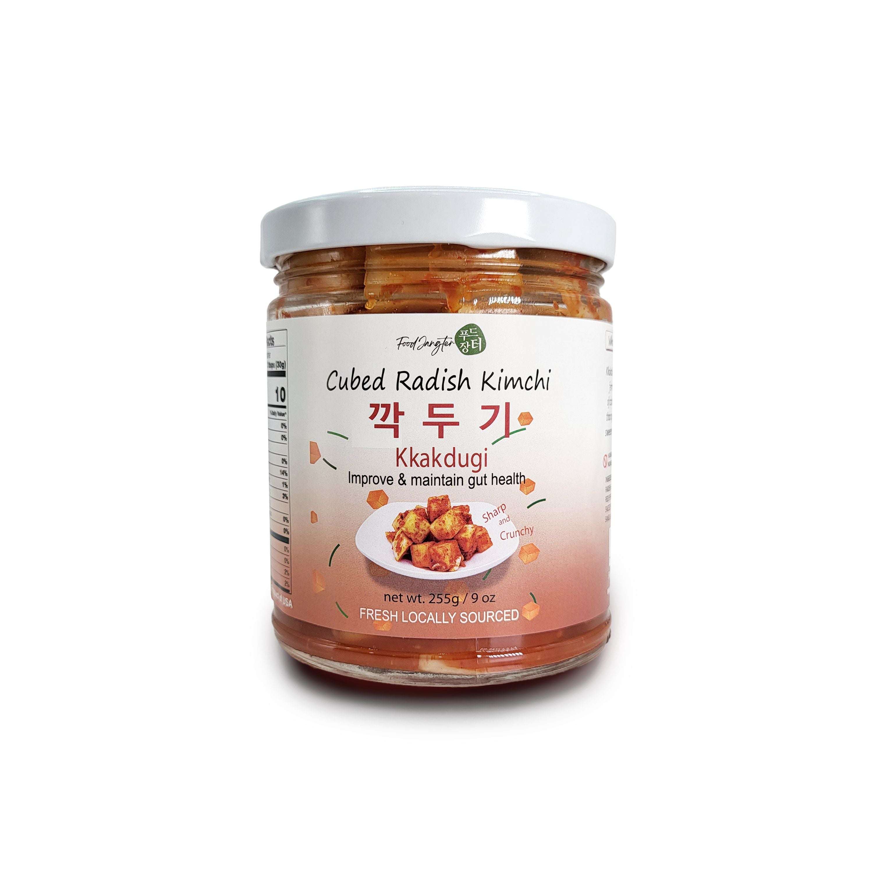Food Jangter fermented cubed radish kimchi in a jar – traditional Korean side dish, crunchy and mildly spicy