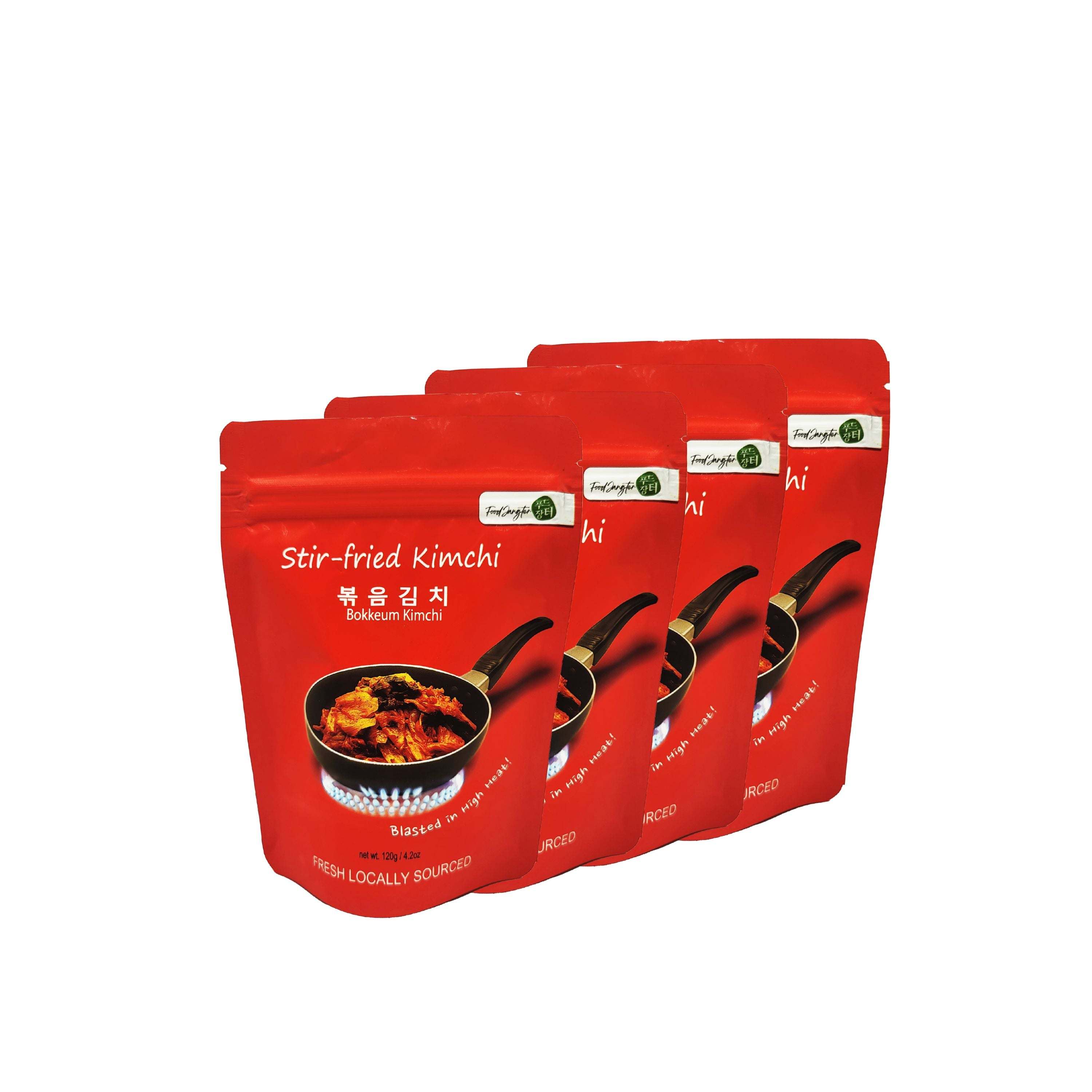 Stir-fried kimchi single-serve 4-pack pouches on white background