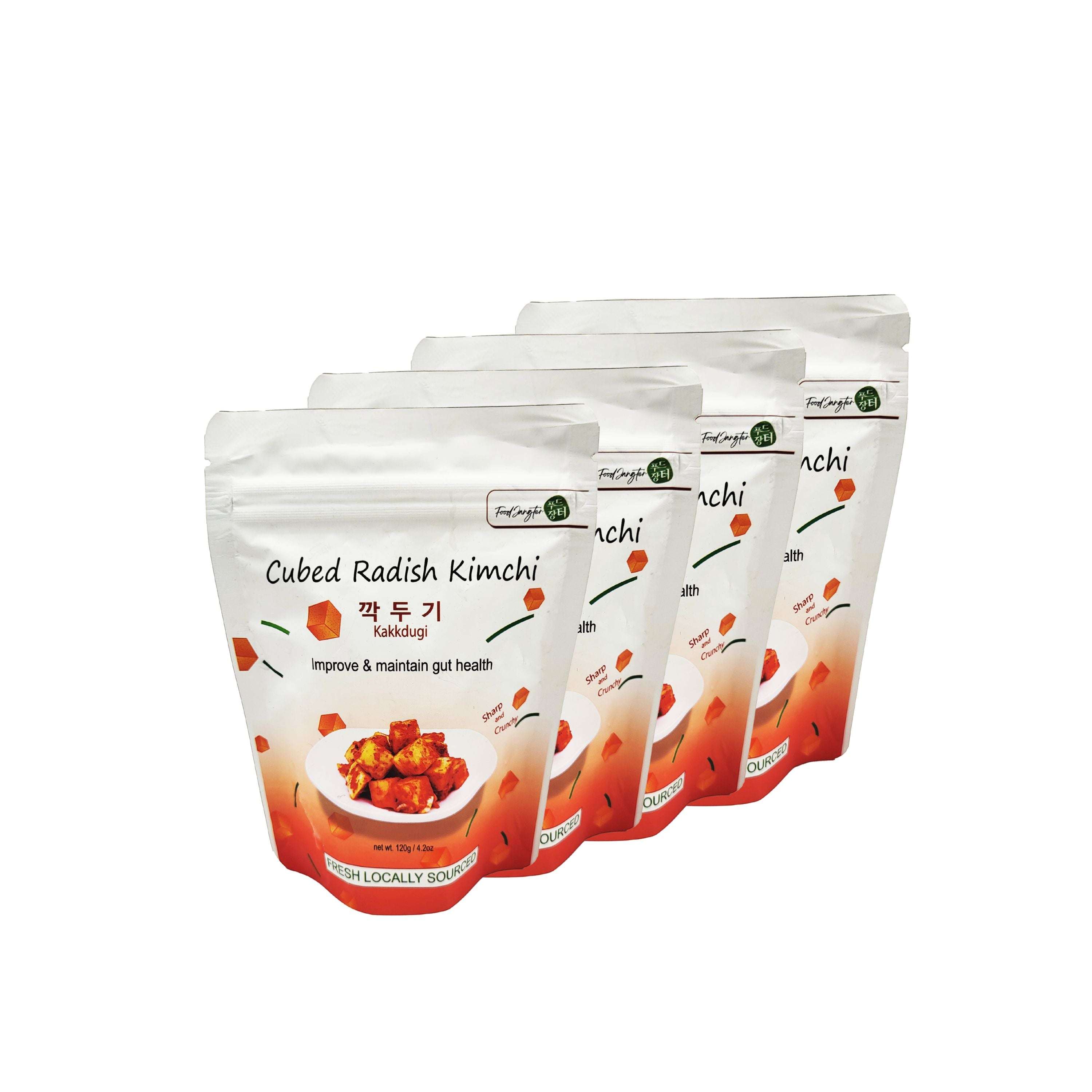 Cubed Radish Kimchi (Kkakdugi) single-serve 4-pack pouches on white background