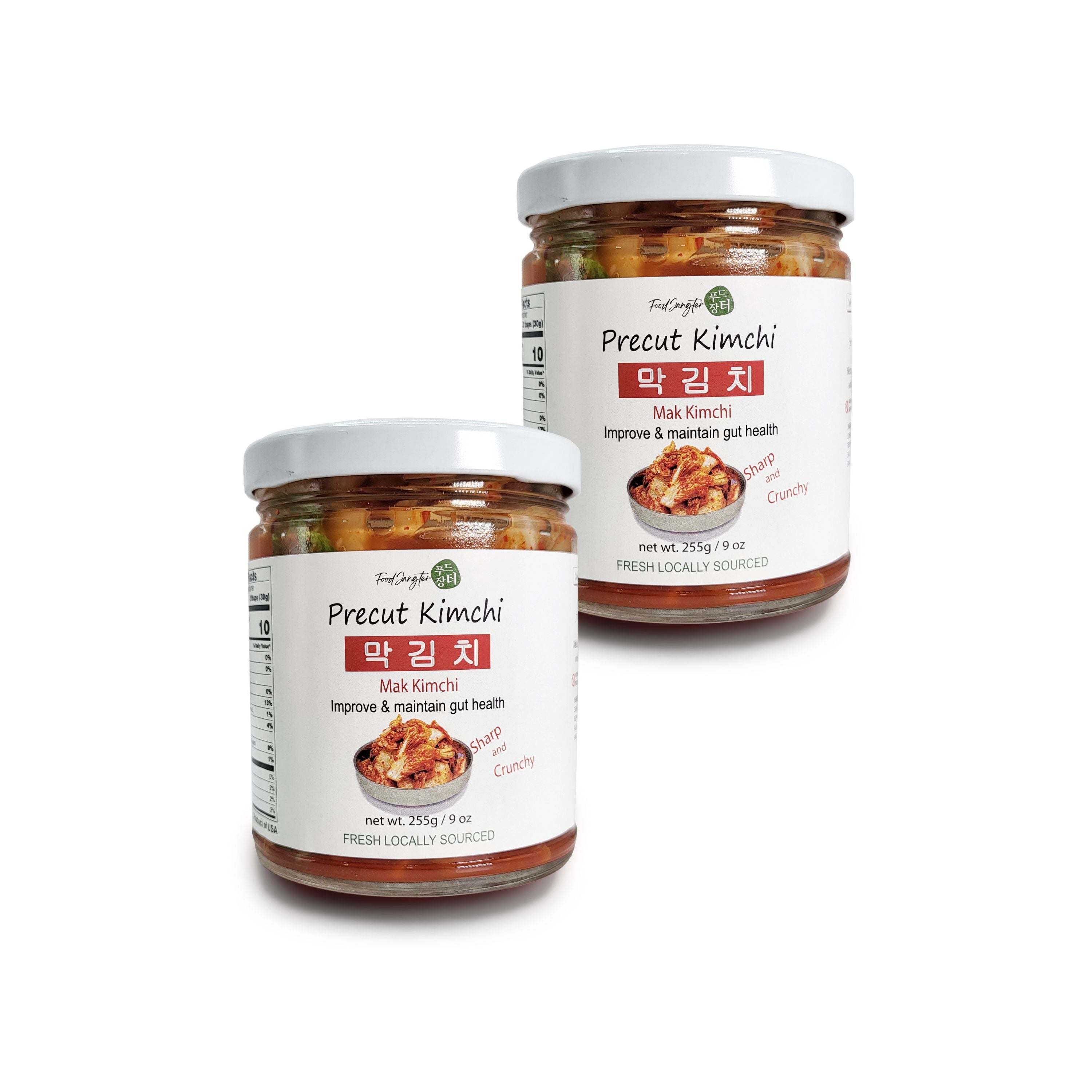 Precut kimchi (Mak Kimchi) two jars on a white background