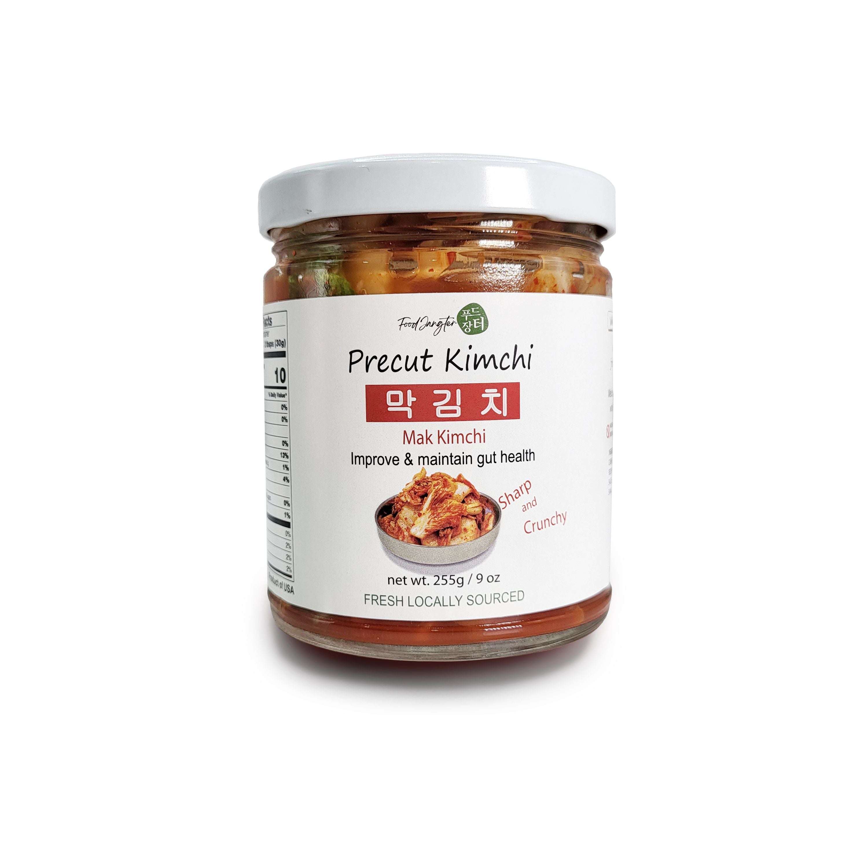 Precut Mak Kimchi in a jar, Korean fermented napa cabbage with chili seasoning, front label shown
